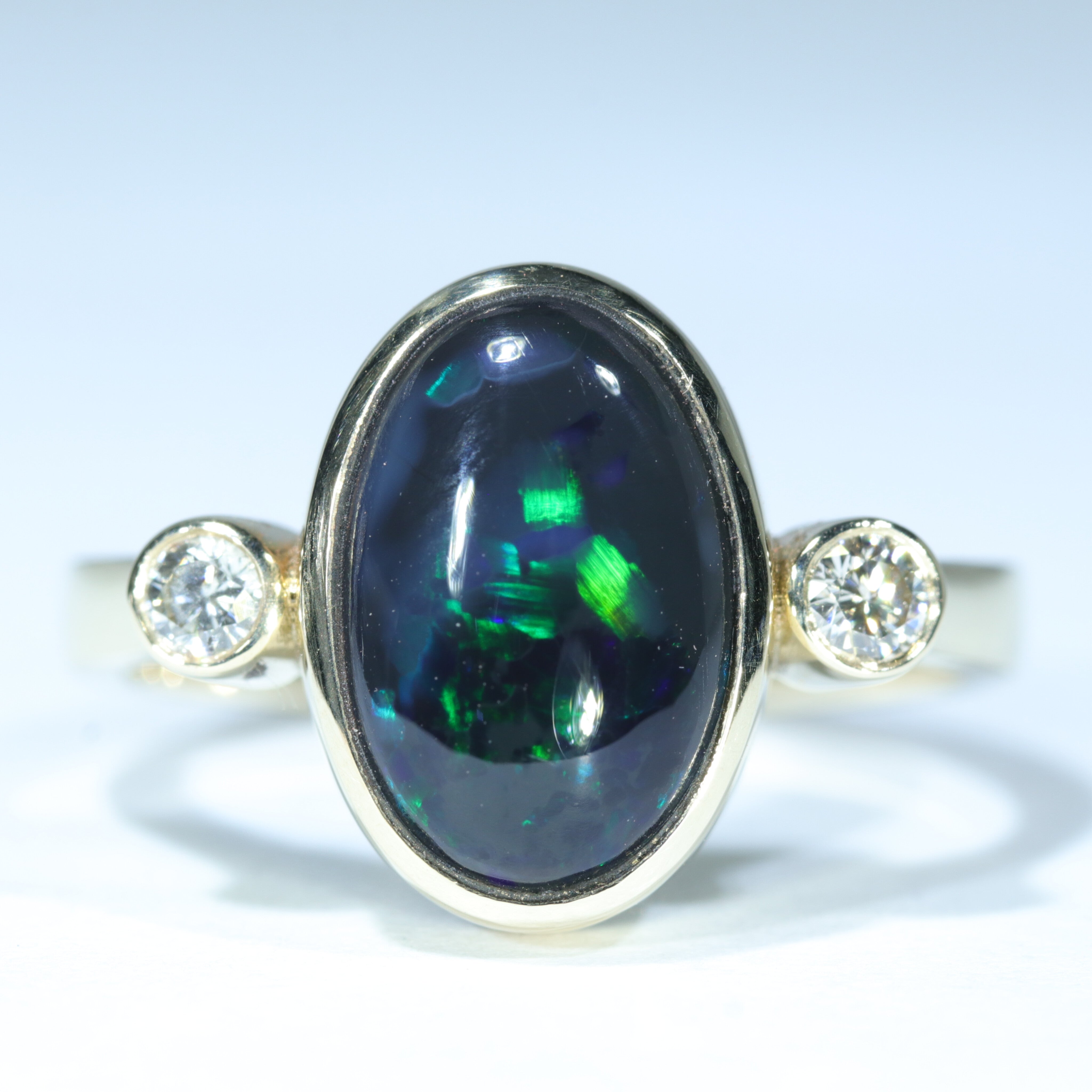 Estate Black Opal and Diamond Halo Ring